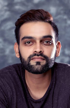 Avi Vasu as Director