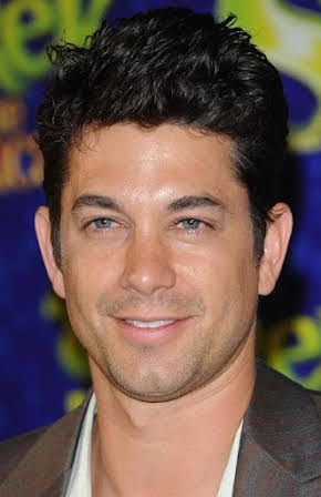 Adam Garcia as 