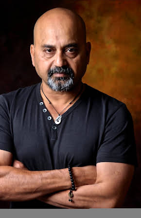 Shailesh Prajapati as Director