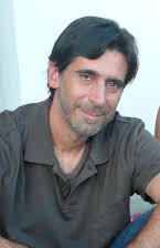 Alessandro Camon som Director