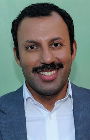 Rizwan Manji as 