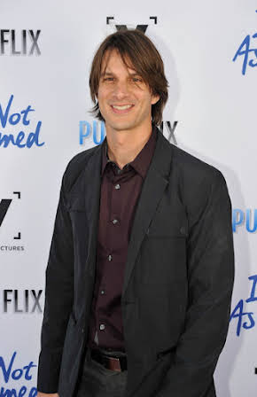 Brian Baugh as Director