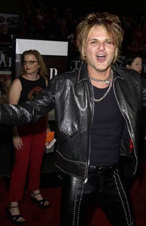 Rikki Rockett as 