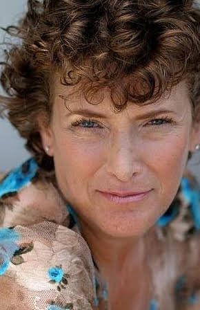 Noni White as Director
