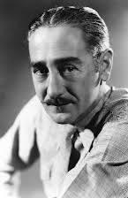 Adolphe Menjou as 