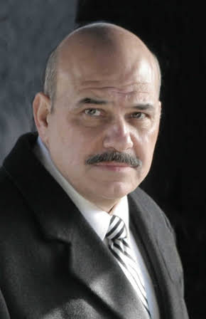 Jon Polito as 