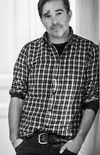 Daniel di Grado som Director