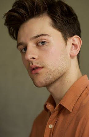 Travis Tope as 