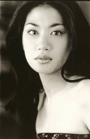 Liza Lapira as 