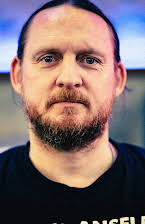 Kieron Hawkes as Director