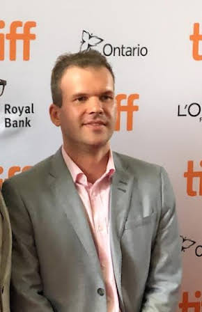 Janek Ambros as Director