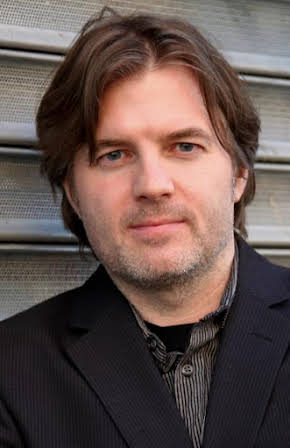 George Strayton as Director