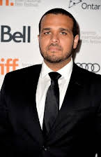 Aaron Burns as Director