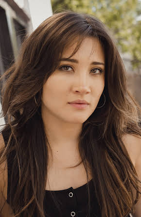 Erika Daly as 