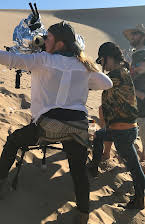 Sarah Phillips as Director