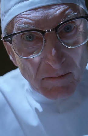 Alan Giles as 