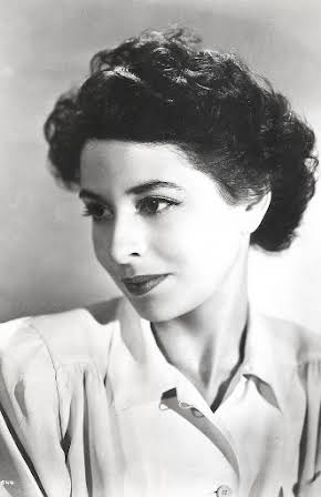 Pamela Mason as 