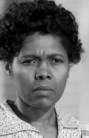 Estelle Evans as 