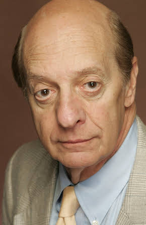 Basil Hoffman as 