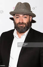 Mike Capozzi as Director