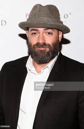 Mike Capozzi as Director