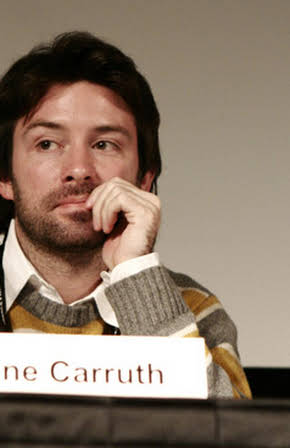 Shane Carruth as 