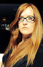 Elaine Bogan as Director