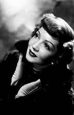 Claudette Colbert as 