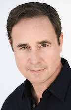 Rustam Branaman as Director