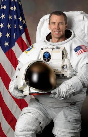 Andrew J. Feustel as 