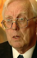 John F. Schuessler as 