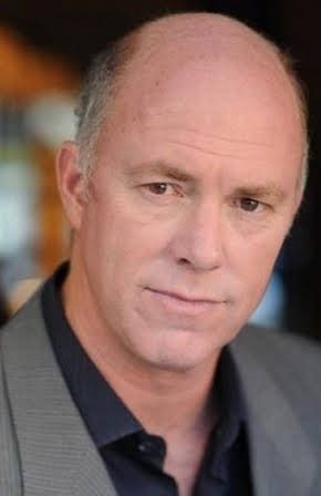 Michael Gaston as 