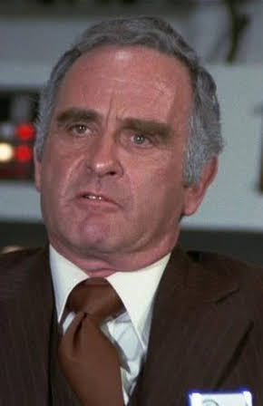 Norman Burton as 