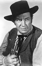 Andy Devine como Ben Dance