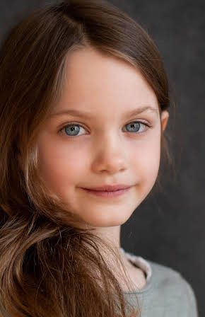 Caoilinn Springall as 