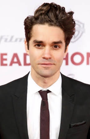 Max Befort as Nik Wachsman