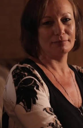 Carey Gibson as Herself - Nicholas' Sister