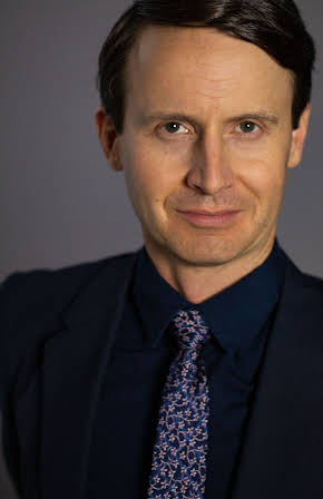 Jesse Merlin as 
