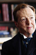 Edward Hibbert como 