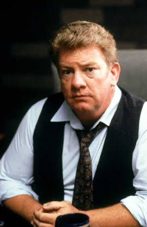 Charles Hallahan as 