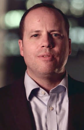 John Cote as 