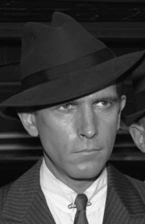 J.D. Cannon as 