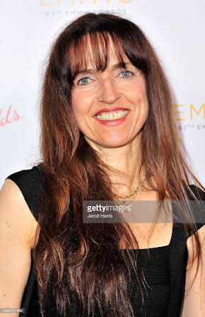 Bettina Gilois as Director