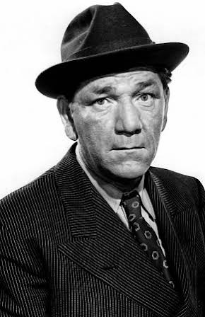 Shemp Howard as 