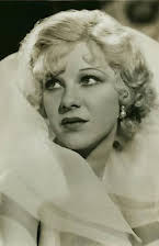 Glenda Farrell as 
