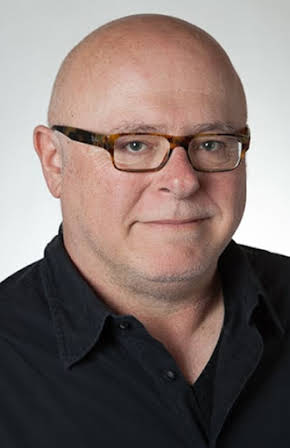 Tibor Takács as Director