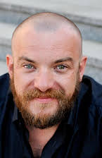 Lukasz Palkowski as Director