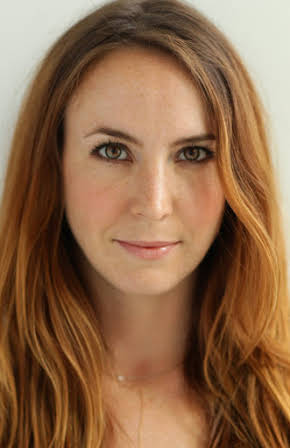 Katie Blake as 