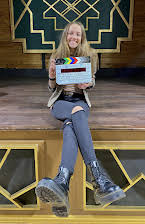 Kelsie Cummings as Director