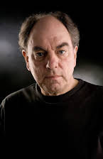 Alun Armstrong as 